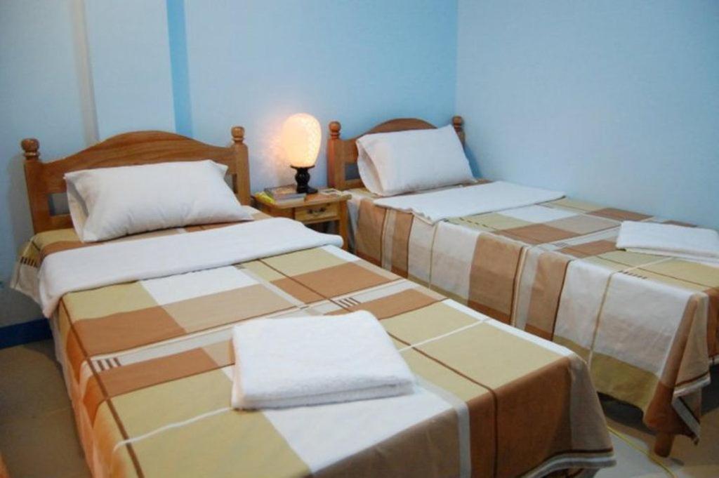 Balayong pensión Puerto Princesa Habitación foto