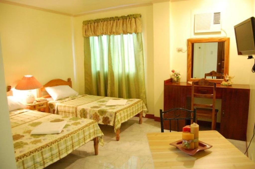 Balayong pensión Puerto Princesa Habitación foto